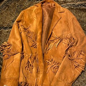 Fringe jacket with bone clasp